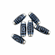 Blue and silver cylindrical beads on a white background
