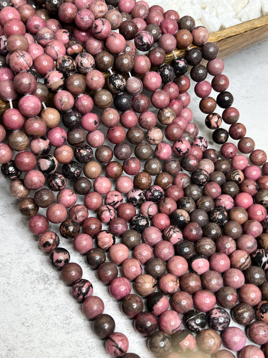 Smooth Black Rhodonite Gemstone Beads | Healing Properties | Pink and Black Gemstone Beads | 12mm, 10mm, & 6mm | DIY Jewelry Designs