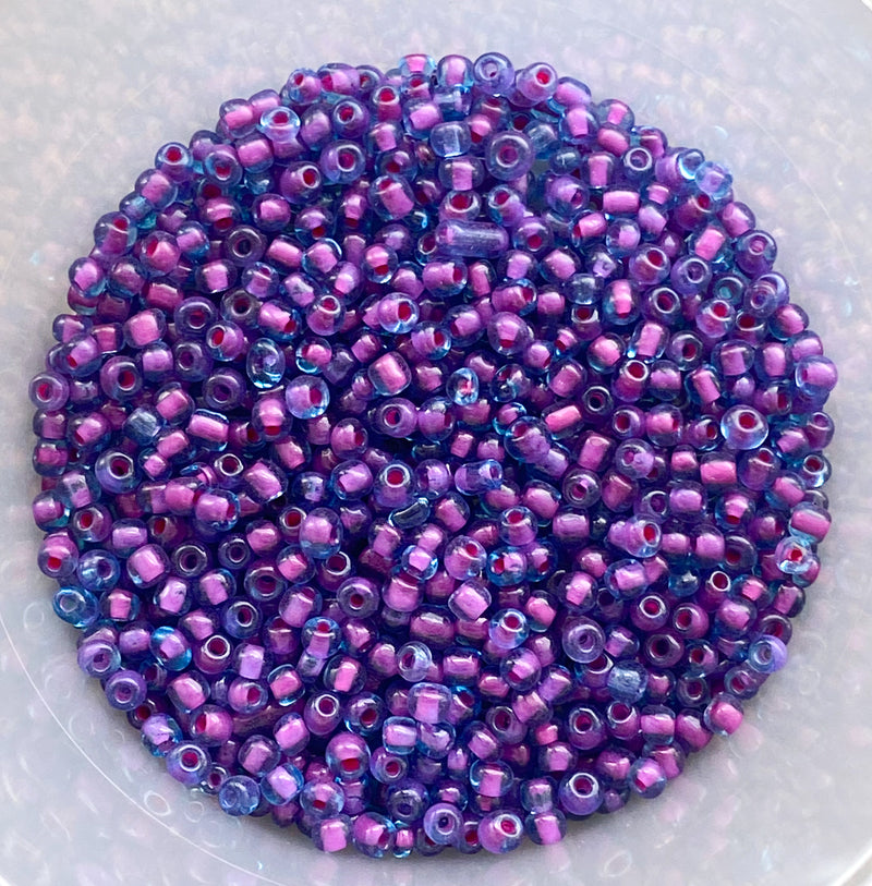 6/0 Translucent Fuchsia Lined Blue