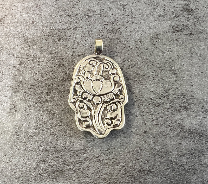 Tibetan Style Hamsa Bone Pendant