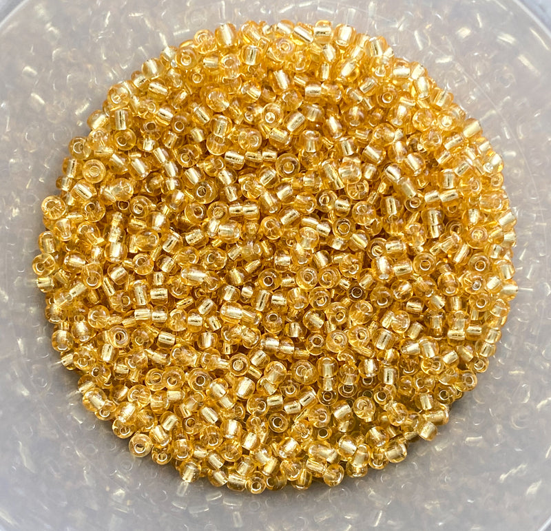 6/0 Silver Lined Translucent Gold