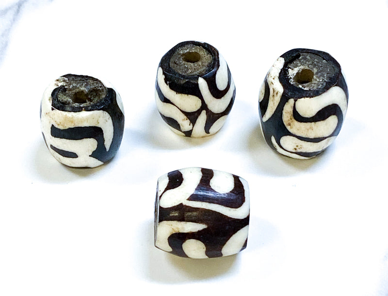 21x22mm Swirl Batik Bone Beads