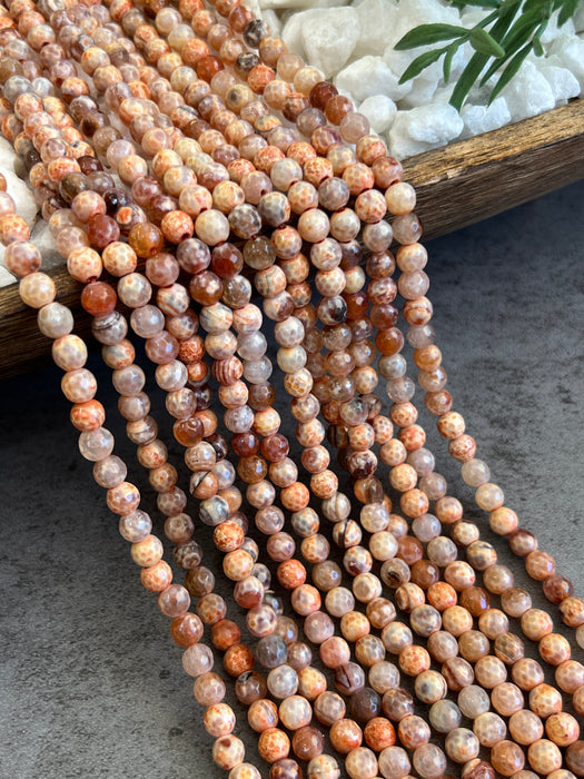 6mm Faceted Peachy Orange Fire Agate