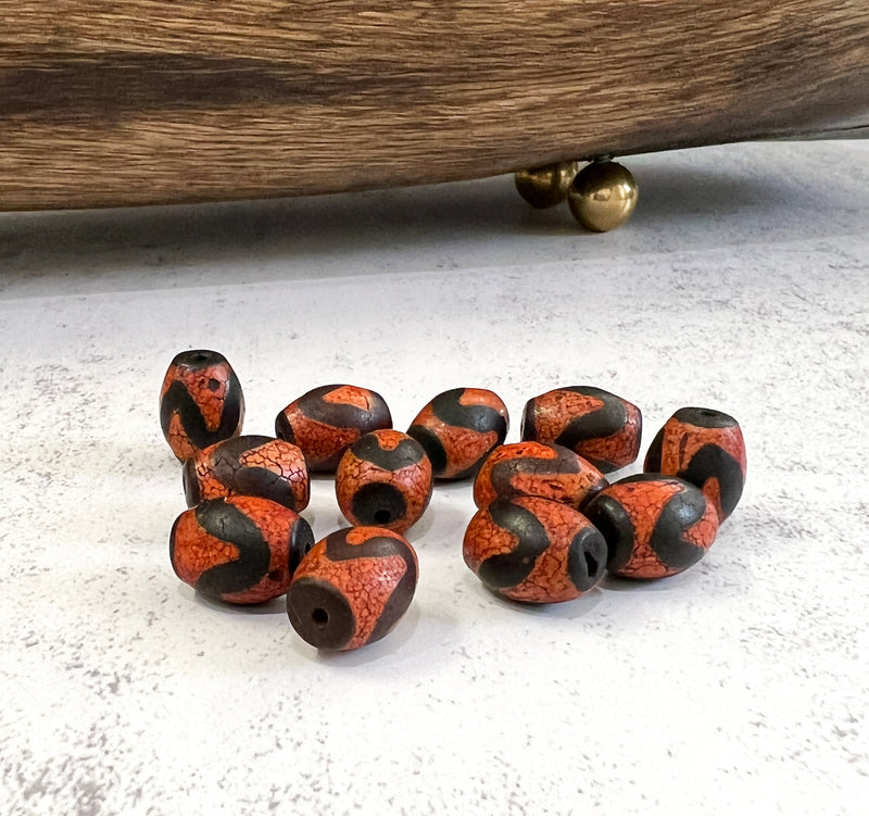 12x15mm Tibetan Beads – Handcrafted Orange & Black Barrel Beads (Sold Per Piece)