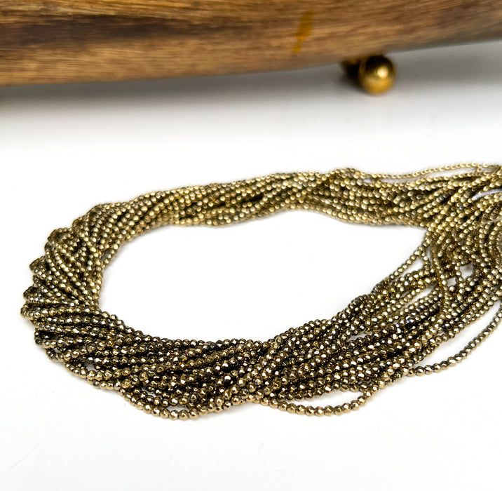 2mm Faceted Light Gold Hematite Beads
