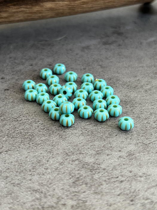 4x7mm Pumpkin Shaped Acrylic Turquoise Beads with Gold Trim